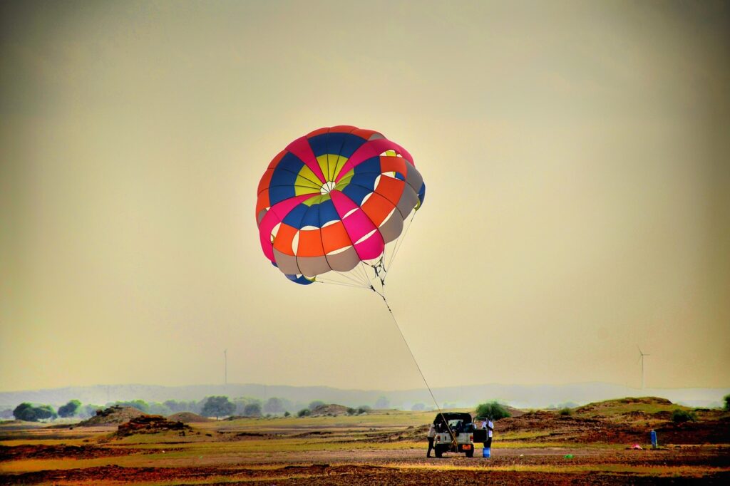 parasailing, desert, field-6945446.jpg